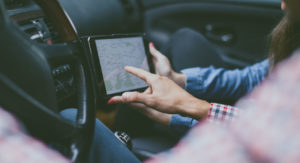 Looking at navigation screen while driving car